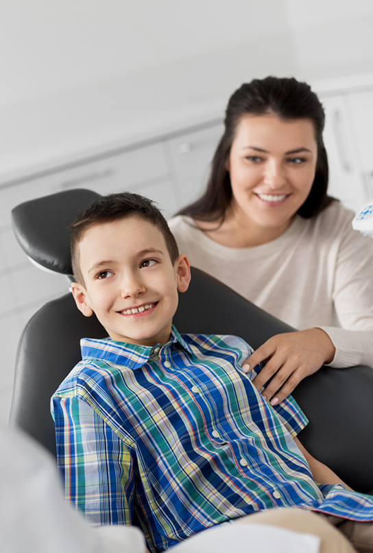 Mother and son visiting their dental office in Maple Valley